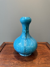 A Chinese monochrome powder-blue garlic-mouth vase with chilong handles, 18/19th C.