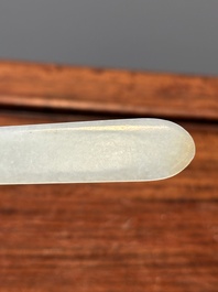Quatre pi&egrave;ces sculpt&eacute;es en jade blanc, c&eacute;ladon et rouille, Chine, Qing