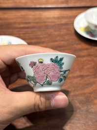 A pair of Chinese famille rose 'peony' cups and saucers, Yongzheng