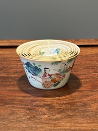 Een zeldzame set van tien Chinese famille rose kommen in oplopend formaat met erotisch decor, Daoguang merk en periode