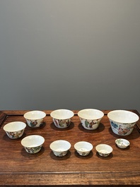 Een zeldzame set van tien Chinese famille rose kommen in oplopend formaat met erotisch decor, Daoguang merk en periode