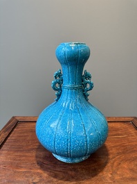 A Chinese monochrome powder-blue garlic-mouth vase with chilong handles, 18/19th C.