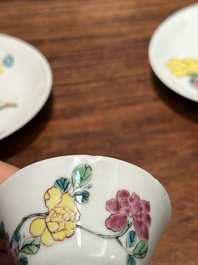 A pair of Chinese famille rose 'peony' cups and saucers, Yongzheng