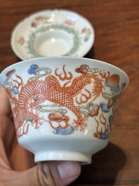 Four Chinese famille rose covered bowls, three with saucers and a 'dragon' bowl, signed Wang Darong 王大榕, 19/20th C.