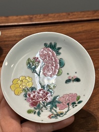 A pair of Chinese famille rose 'peony' cups and saucers, Yongzheng