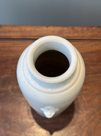 A Chinese Dehua blanc de Chine vase with floral anhua design, Kangxi