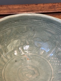 RETURNED 10/12/24 Two rare Chinese Longquan celadon bowls with figural anhua design, Yuan