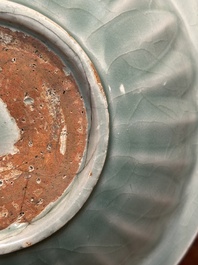 A Chinese Longquan celadon 'four carps' plate, Yuan or later