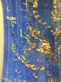 A pair of Chinese gilt-decorated powder-blue 'yenyen' vases with gilt bronze mounts, Kangxi