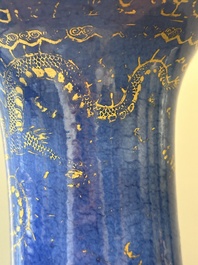 A pair of Chinese gilt-decorated powder-blue 'yenyen' vases with gilt bronze mounts, Kangxi