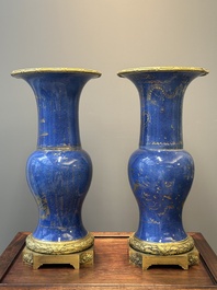 A pair of Chinese gilt-decorated powder-blue 'yenyen' vases with gilt bronze mounts, Kangxi