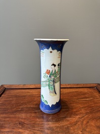 A Chinese famille verte powder-blue-ground 'court lady' beaker vase, Kangxi