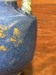 A Chinese gilt-decorated powder-blue teapot and cover with a faux-bamboo handle, Kangxi