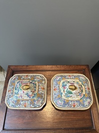 Een paar 'CSM' gemonogrammeerde Chinese famille rose dekselterrines, Jiaqing