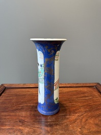 A Chinese famille verte powder-blue-ground 'court lady' beaker vase, Kangxi