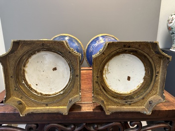 A pair of Chinese gilt-decorated powder-blue 'yenyen' vases with gilt bronze mounts, Kangxi