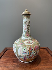 Een Chinese Canton famille rose kom en een flesvormige dekselvaas, 19e eeuw