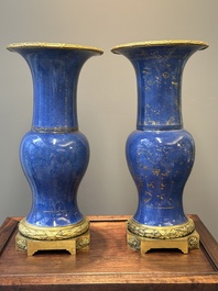 A pair of Chinese gilt-decorated powder-blue 'yenyen' vases with gilt bronze mounts, Kangxi