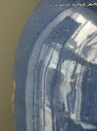 A Chinese gilt-decorated powder-blue vase with a phoenix among blossoming branches , Qianlong