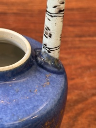 A Chinese gilt-decorated powder-blue teapot and cover with a faux-bamboo handle, Kangxi
