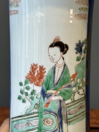 A Chinese famille verte powder-blue-ground 'court lady' beaker vase, Kangxi