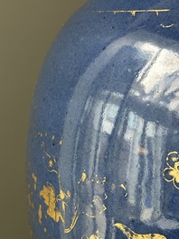 A Chinese gilt-decorated powder-blue vase with a phoenix among blossoming branches , Qianlong