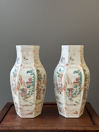A pair of hexagonal Chinese Canton famille rose 'mandarin subject' vases, Qianlong