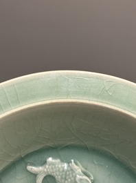 A Chinese Longquan celadon 'four carps' plate, Yuan or later