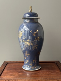 A Chinese gilt-decorated powder-blue vase with a phoenix among blossoming branches , Qianlong