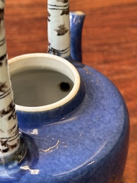 A Chinese gilt-decorated powder-blue teapot and cover with a faux-bamboo handle, Kangxi