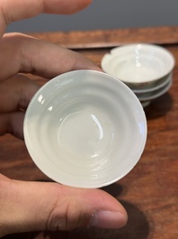 Six Chinese Canton famille rose 'mandarin subject' cups and saucers with four covers, Qianlong