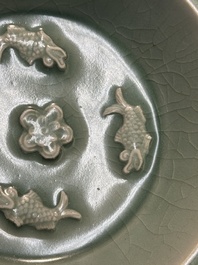 A Chinese Longquan celadon 'four carps' plate, Yuan or later