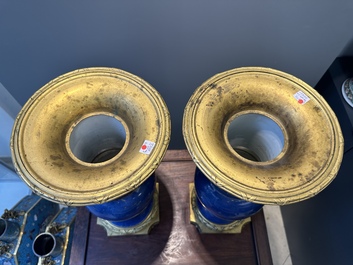A pair of Chinese gilt-decorated powder-blue 'yenyen' vases with gilt bronze mounts, Kangxi
