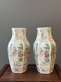 A pair of hexagonal Chinese Canton famille rose 'mandarin subject' vases, Qianlong