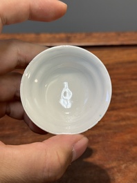 Six Chinese Canton famille rose 'mandarin subject' cups and saucers with four covers, Qianlong