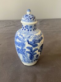 A Chinese blue and white covered vase with fishermen in a river landscape, jade mark, Kangxi