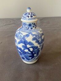 A Chinese blue and white covered vase with fishermen in a river landscape, jade mark, Kangxi