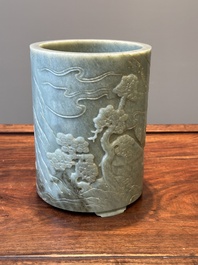 A Chinese spinach jade brush pot with relief design, 18th C.