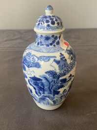 A Chinese blue and white covered vase with fishermen in a river landscape, jade mark, Kangxi