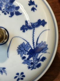 A Chinese blue and white covered bowl with floral design and gilt bronze mounts, Transitional period