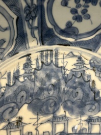 A large Chinese blue and white Swatow dish with a lobster and a carp at a fishing village, Ming