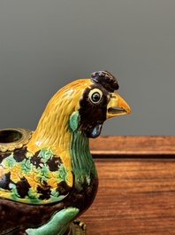 A pair of Chinese sancai-glazed chicken ewers mounted as candleholders with gilt bronze, Kangxi