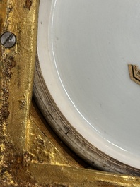 Een Chinese blauw-witte en koperrode 'draken' vaas met verguld bronzen montuur, 18e eeuw