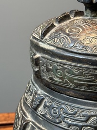 A Chinese bronze ritual wine vessel and cover, 'you', Yuan/Ming