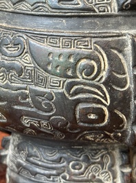 A Chinese bronze ritual wine vessel and cover, 'you', Yuan/Ming