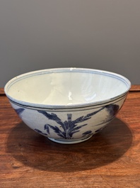 A Chinese blue and white bowl with figures in a landscape, Chenghua mark, Chongzhen