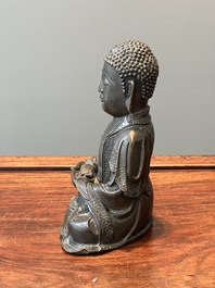 A Chinese bronze sculpture of Buddha, Ming