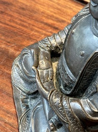 A Chinese bronze sculpture of Buddha, Ming