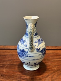 A Chinese blue and white ewer with landscape design, Transitional period
