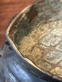 A Chinese bronze ritual wine vessel and cover, 'you', Yuan/Ming